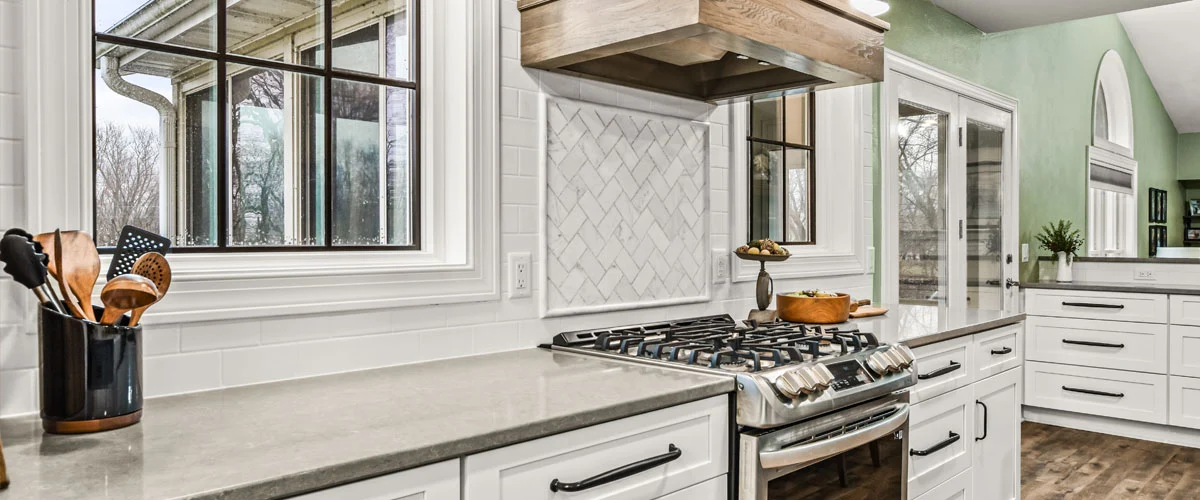 A kitchen featuring a stove and oven, showcasing a functional cooking space with modern appliances.