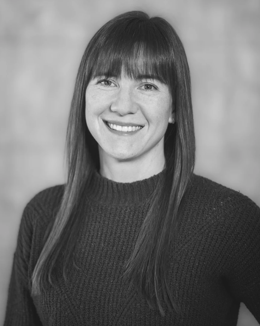 A black and white portrait of Tasha Frie